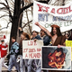 Christ (second from right) leads pro-life demonstrators at a 1995 rally in Washington, D.C.